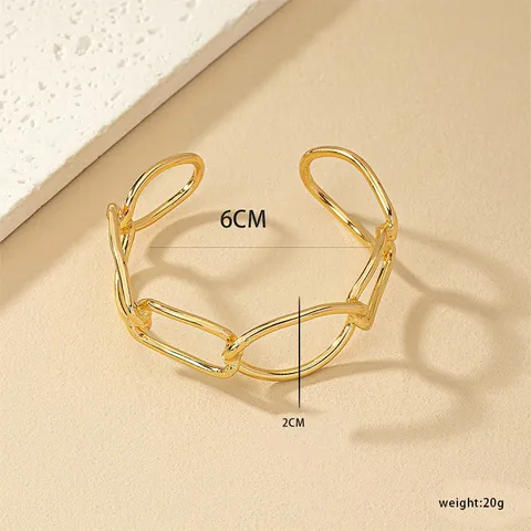 Gold Plated Bracelet With Oval Cutout And Open Cuff