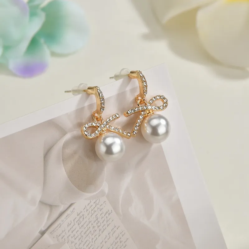Rhinestone And Pearl French Bow Earrings