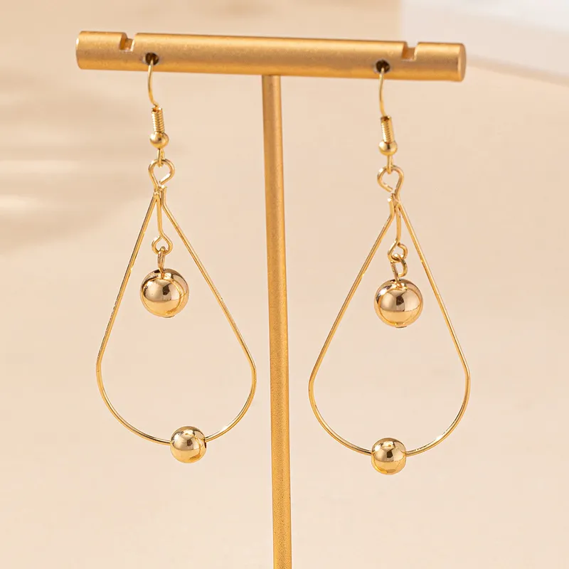Gold Hollow Water Drop Earrings With Bead Details