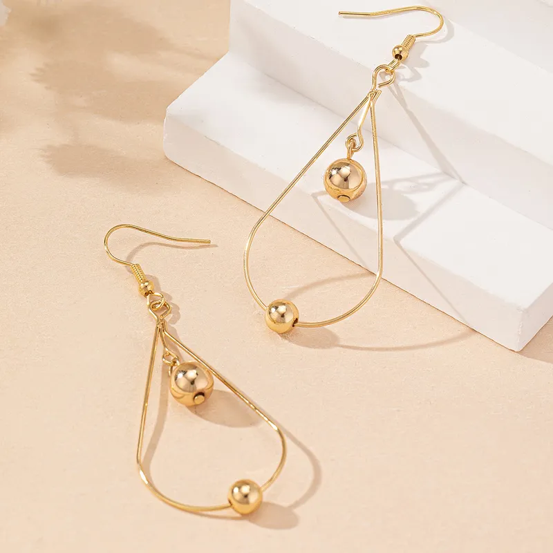 Gold Hollow Water Drop Earrings With Bead Details