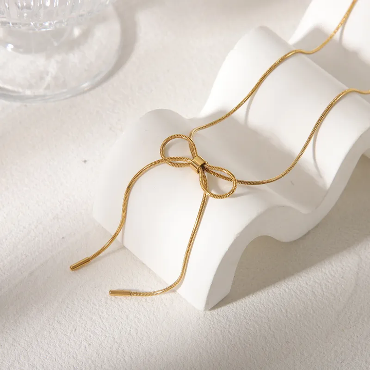 Gold Plated Necklace With Long Bow Knot Detail