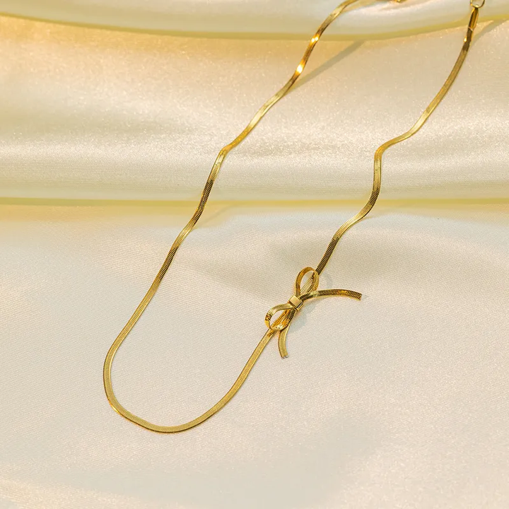 Gold Plated Flat Snake Chain Necklace With Bow Knot