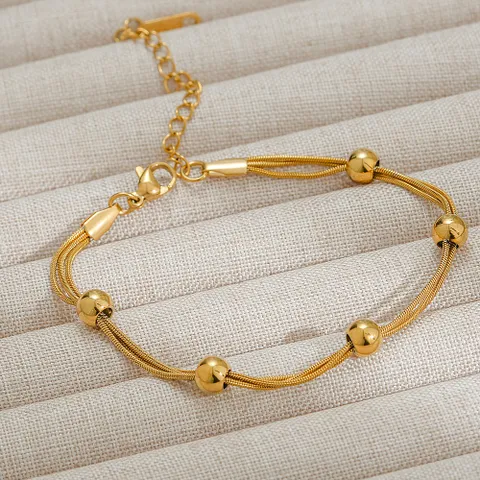 Gold Plated Ball And Triple Layer Snake Bracelet