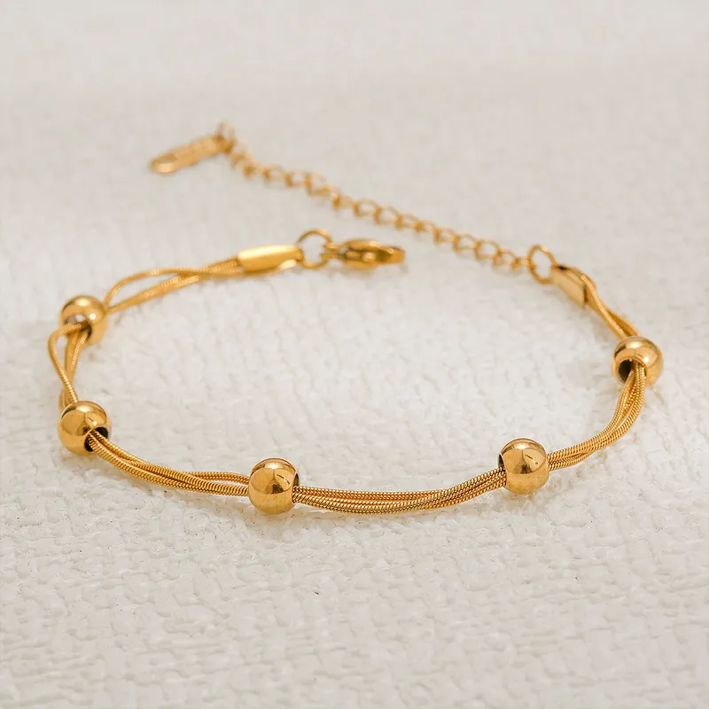 Gold Plated Ball And Triple Layer Snake Bracelet