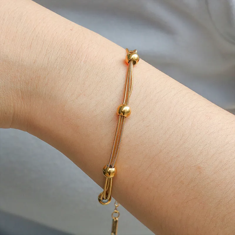 Gold Plated Ball And Triple Layer Snake Bracelet