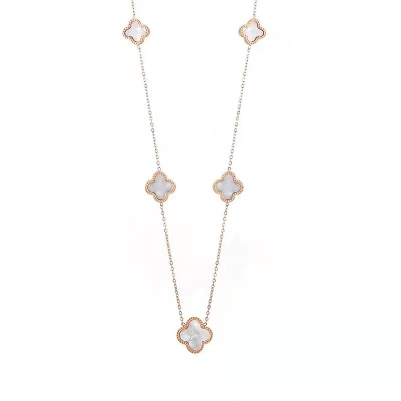 Gold plated multi motif clover necklace - white