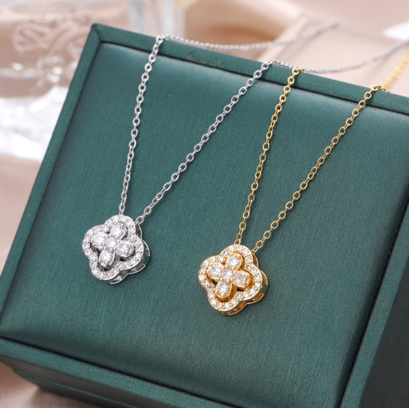 White gold plated pendant necklace with diamante clover detail