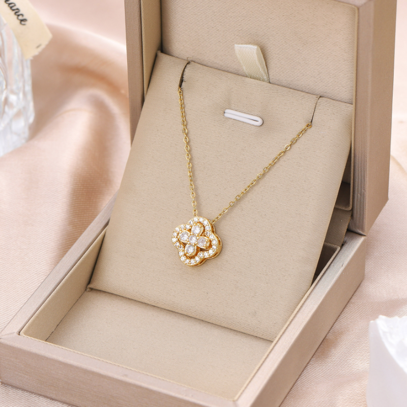 Gold plated pendant necklace with diamante clover detail